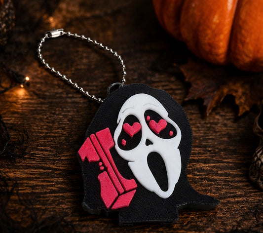 Pink ghostface phone soda can opener